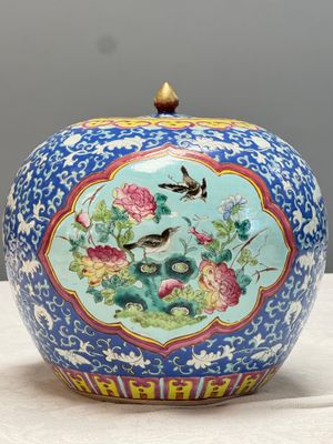 A pair of Chinese famille rose 'Birds among Flowering Branches' jars and covers — photo 2