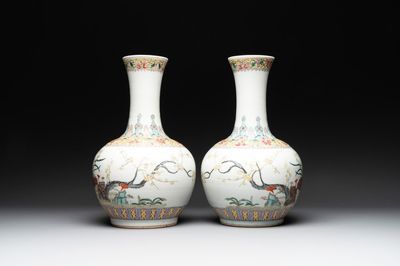 A pair of Chinese famille rose bottle vases with flowers, Qianlong mark, Republic