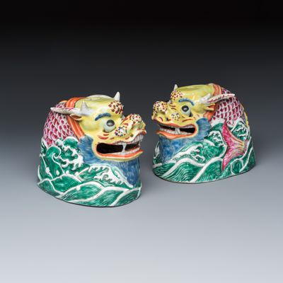 A pair of Chinese famille rose carp-dragons, 18/19th C.
