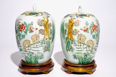 A pair of Chinese famille rose covered jars with cranes and deers, 19/20th C.