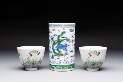 A pair of Chinese famille rose 'crane' cups and a 'dragon' brush pot, Guangxu mark, 20th C.