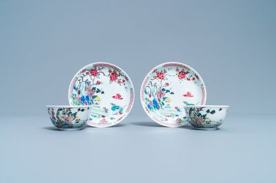 A pair of Chinese famille rose cups and saucers with landscape design, Yongzheng