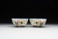 A pair of Chinese famille rose eggshell bowls with floral design, Qianlong mark, 20th C.