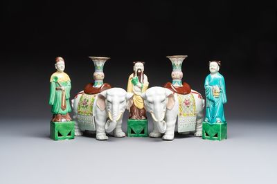 A pair of Chinese famille rose elephants carrying a 'Gu' vase and three sancai-glazed immortals, 20th C.