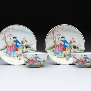 A pair of Chinese famille rose 'European subject' cups and saucers, Qianlong — photo 1