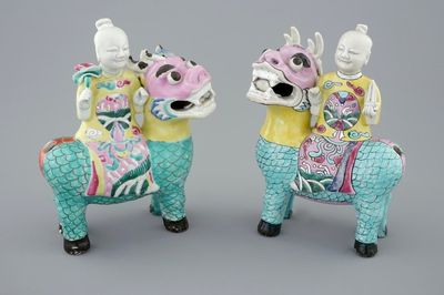 A pair of Chinese famille rose figures of the Immortal Twins, Hehe Erxian, riding a kylin, 18th C