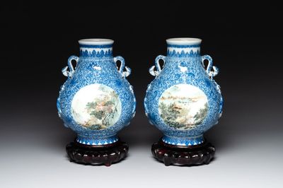 A pair of Chinese famille rose 'hu' vases with fine landscapes, Qianlong mark, Republic