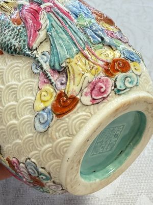 A pair of Chinese famille rose 'Immortals' vases with relief design, Qianlong mark, Republic — photo 35