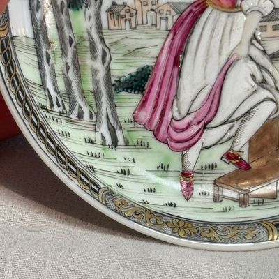 A pair of Chinese famille rose 'Milkmaid' saucers — photo 17