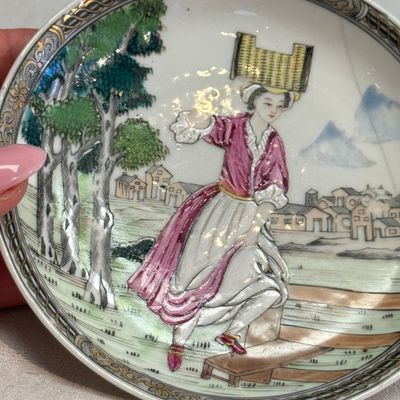 A pair of Chinese famille rose 'Milkmaid' saucers — photo 22