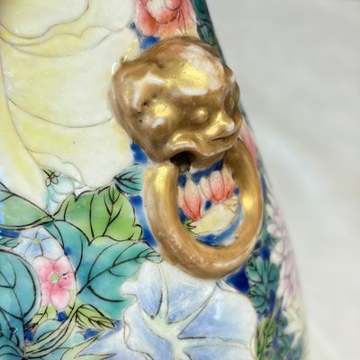 A pair of Chinese famille rose 'Millefleurs' vases with lion-head handles — photo 7