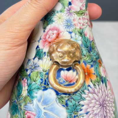 A pair of Chinese famille rose 'Millefleurs' vases with lion-head handles — photo 19