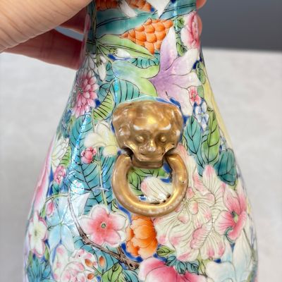 A pair of Chinese famille rose 'Millefleurs' vases with lion-head handles — photo 21