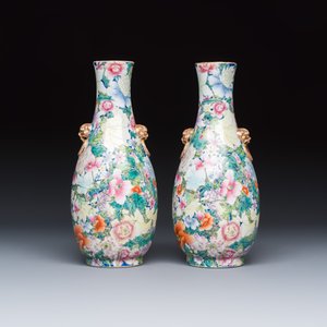 A pair of Chinese famille rose 'Millefleurs' vases with lion-head handles — photo 4