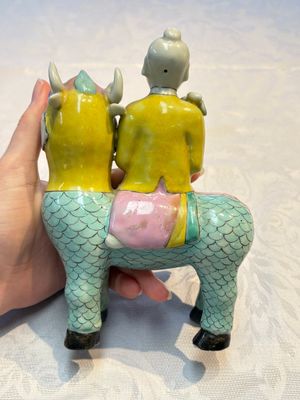 A pair of Chinese famille rose models of a boy riding a qilin and a bitong, 19/20th C. — photo 25