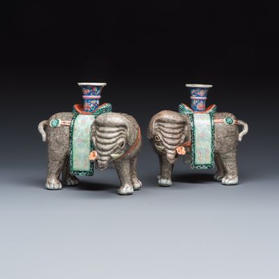 A pair of Chinese famille rose models of elephants, Qianlong/Jiaqing