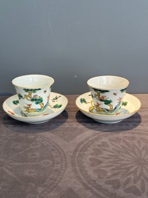 A pair of Chinese famille rose 'monkey and deer' cups and saucers, Tongzhi mark and of the period — photo 1