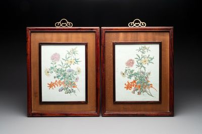 A pair of Chinese famille rose plaques in wooden frames, 20th C.