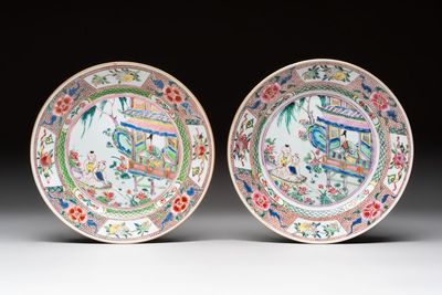 A pair of Chinese famille rose plates with a lady and boys in a boat, Yongzheng/Qianlong