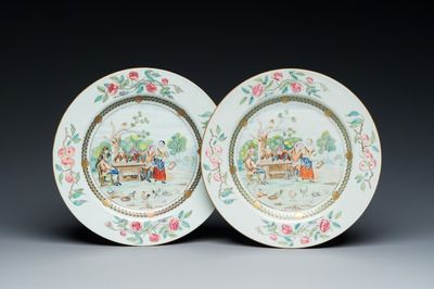 A pair of Chinese famille rose plates with peasants playing cards in the style of the painter David Teniers II, Qianlong