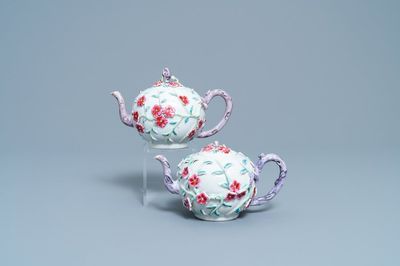 A pair of Chinese famille rose relief-decorated teapots with floral design, Yongzheng