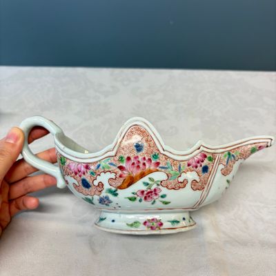 A pair of Chinese famille rose sauceboats with floral scroll design — photo 4
