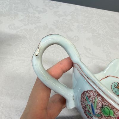 A pair of Chinese famille rose sauceboats with floral scroll design — photo 12