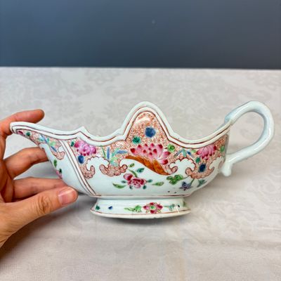 A pair of Chinese famille rose sauceboats with floral scroll design — photo 2