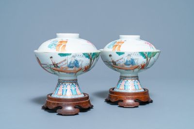 A pair of Chinese famille rose stem bowls and covers, Jiaqing mark and of the period