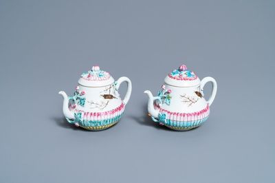 A pair of Chinese famille rose teapots and covers with applied design, Yongzheng