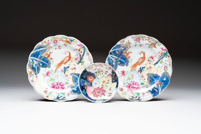 A pair of Chinese famille rose 'tobacco leaf' plates and a saucer, Qianlong