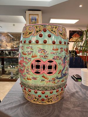 A pair of Chinese famille rose turquoise-ground 'dragon' garden seats, 20th C. — photo 1