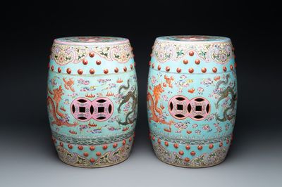 A pair of Chinese famille rose turquoise-ground 'dragon' garden seats, 20th C.