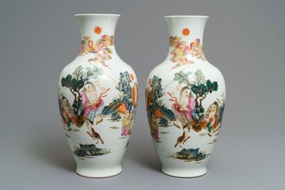 A pair of Chinese famille rose vases, Qianlong mark, 20th C.