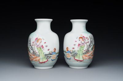 A pair of Chinese famille rose vases, Qianlong mark, 20th C.