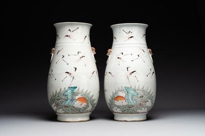 A pair of Chinese famille rose vases with cranes, 19th C.