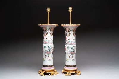A pair of Chinese famille rose vases with fine gilt-bronze lamp mounts, Yongzheng