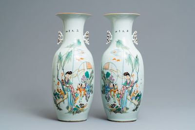 A pair of Chinese famille rose vases with ladies and boys in a garden, 19/20th C.