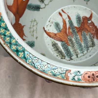 A pair of Chinese famille rose yellow-ground 'Antiquities' fish bowls with applied relief design — photo 9