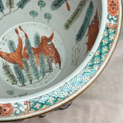 A pair of Chinese famille rose yellow-ground 'Antiquities' fish bowls with applied relief design — photo 12