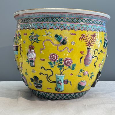 A pair of Chinese famille rose yellow-ground 'Antiquities' fish bowls with applied relief design — photo 26