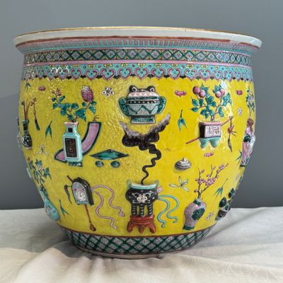 A pair of Chinese famille rose yellow-ground 'Antiquities' fish bowls with applied relief design — photo 29