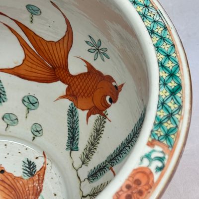 A pair of Chinese famille rose yellow-ground 'Antiquities' fish bowls with applied relief design — photo 36