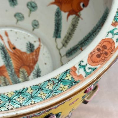 A pair of Chinese famille rose yellow-ground 'Antiquities' fish bowls with applied relief design — photo 37