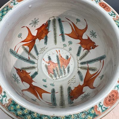 A pair of Chinese famille rose yellow-ground 'Antiquities' fish bowls with applied relief design — photo 38