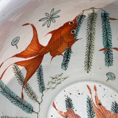 A pair of Chinese famille rose yellow-ground 'Antiquities' fish bowls with applied relief design — photo 39