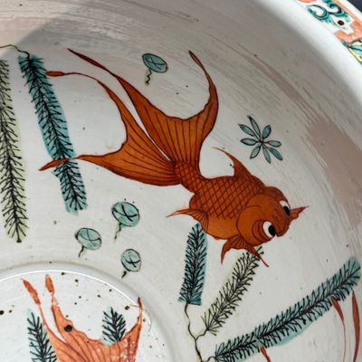 A pair of Chinese famille rose yellow-ground 'Antiquities' fish bowls with applied relief design — photo 40