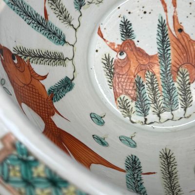 A pair of Chinese famille rose yellow-ground 'Antiquities' fish bowls with applied relief design — photo 42