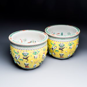 A pair of Chinese famille rose yellow-ground 'Antiquities' fish bowls with applied relief design — photo 1
