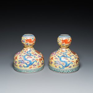 A pair of Chinese famille rose yellow-ground 'dragon' vases, Qianlong mark, 20th C. — 照片 1